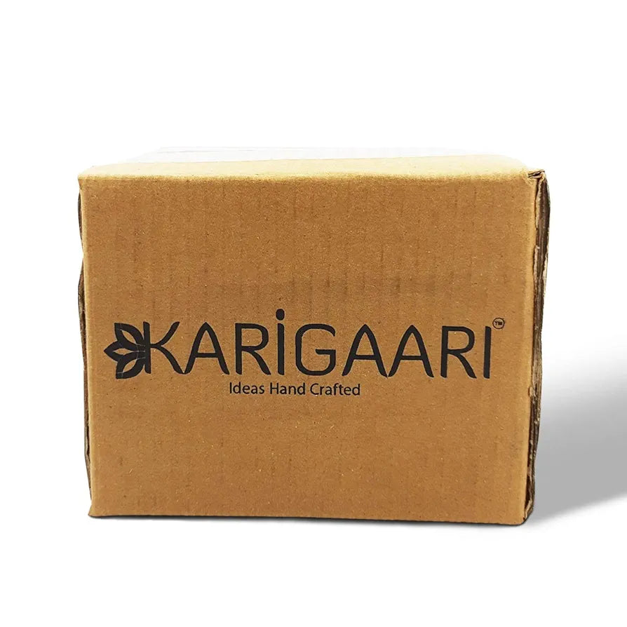 Karigaari India Ganesha Resting on Rocking Chair - Brown & White