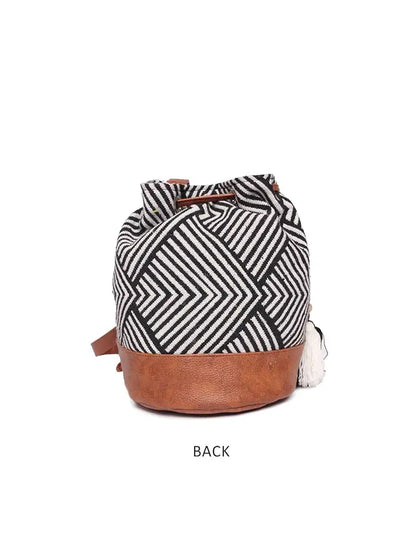 Astrid Textured Sling Bag With Tassels For Girls