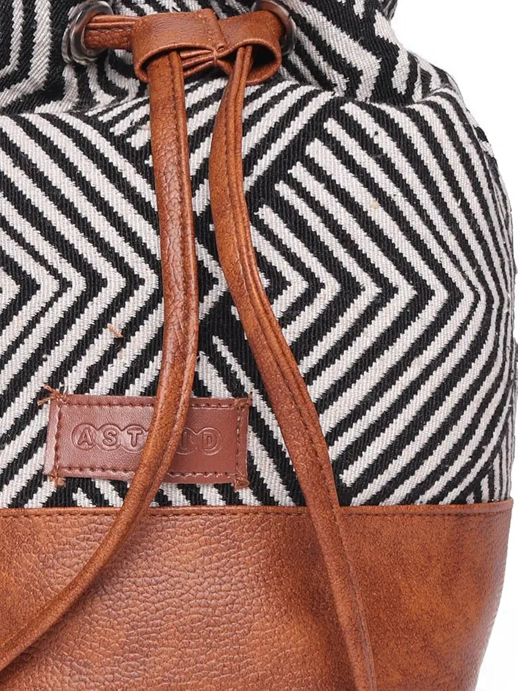 Astrid Textured Sling Bag With Tassels For Girls
